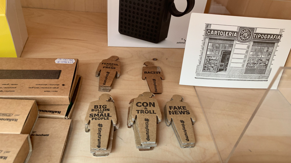 several tiny trumps in a museum gift shop at the Venice Biennale