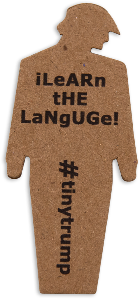 tiny trump with the slogan 'Learn the Language'