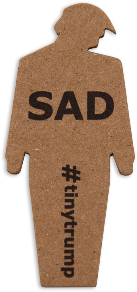 tiny trump with the slogan 'Sad'